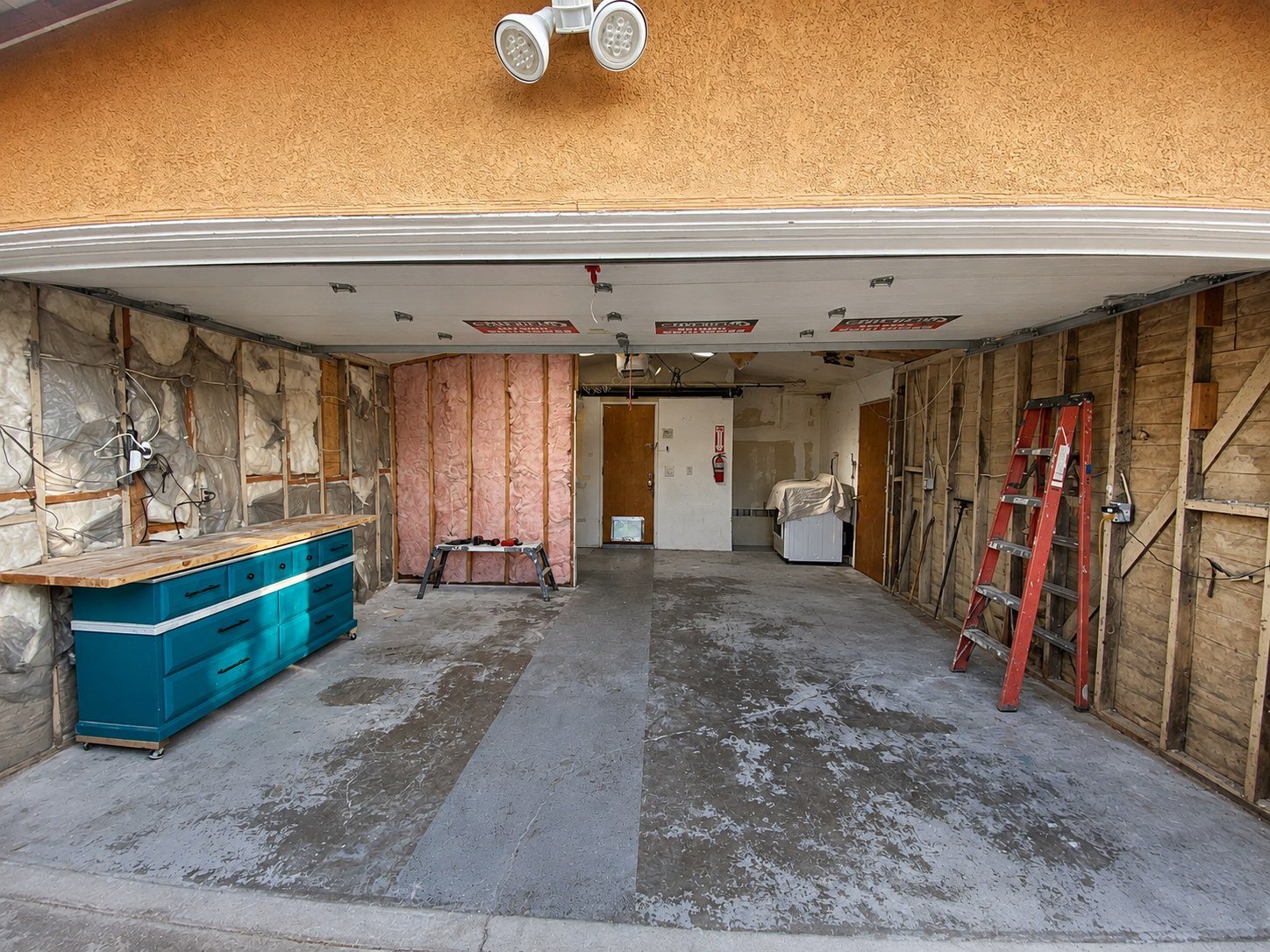 Existing garage and storage space before the ADU conversion