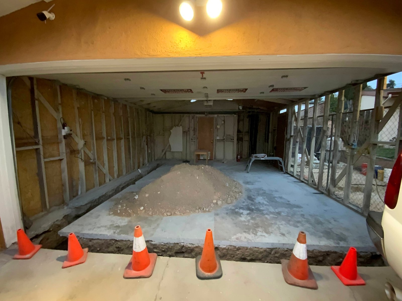 Garage demolition and slab preparation underway
