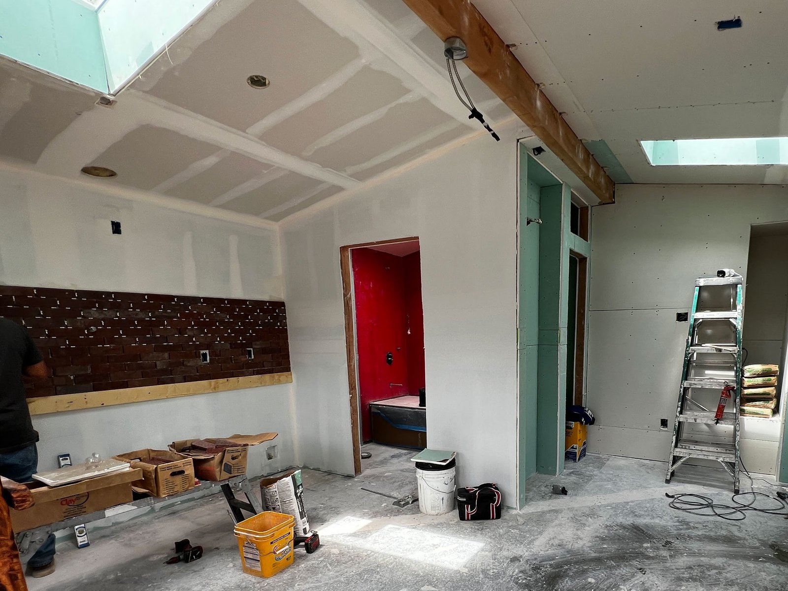 Interior framing and insulation during rough construction