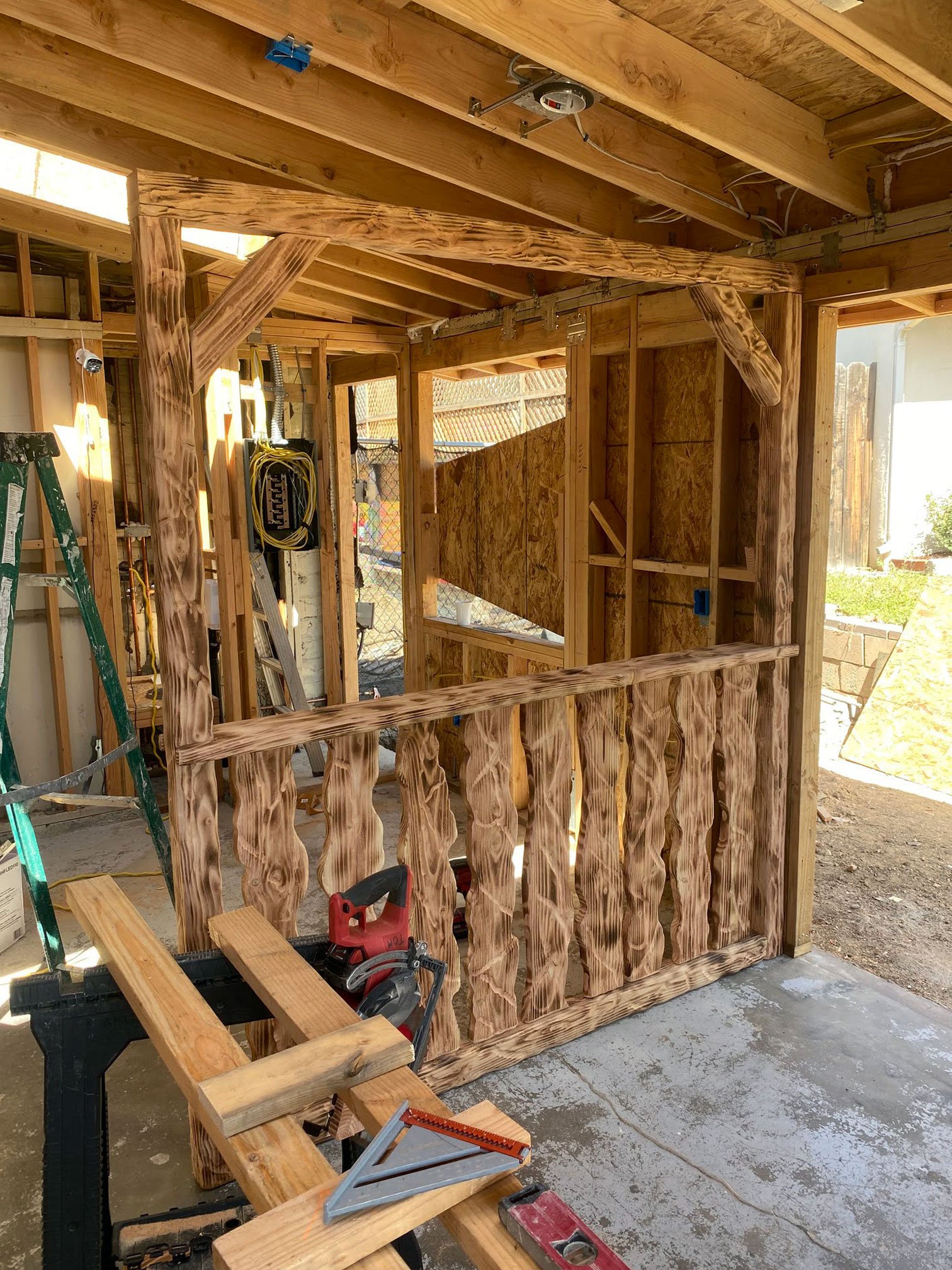 Handcrafted details being installed during the build